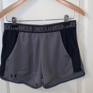 Under Armour black and grey shorts size medium.